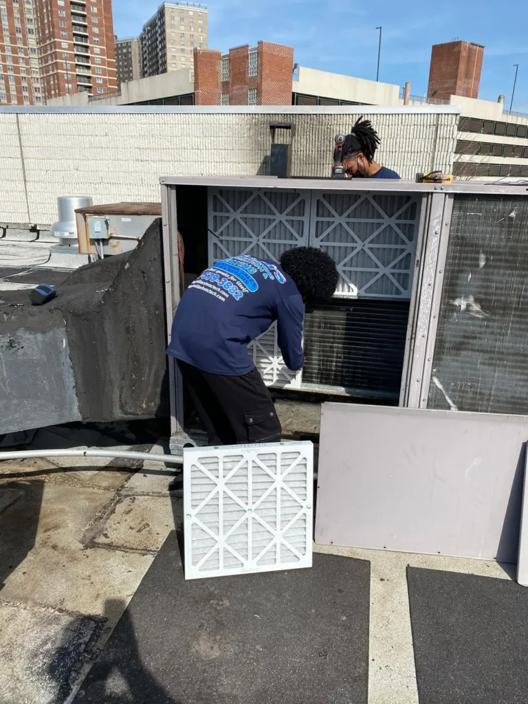 techs-working-on-exterior-refrigeration-unit (3) Technicians working on exterior refrigeration unit